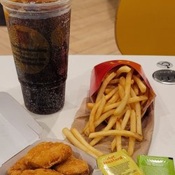 McDonald's - Six piece McNugget sweet and sour hot mustard One fresh unsalted by request fry just plain tonight Coke Zero