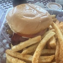 Smash burger with beef bacon and Side of Seasoned Fries Smash burger with beef bacon and Side of Seasoned Fries