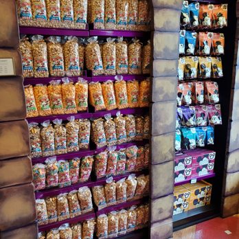 Disney's Candy Cauldron - Various types of popcorn and bagged pretzels - Desserts Near Me - Lake Buena Vista, Florida Disney's Candy Cauldron - Various types of popcorn and bagged pretzels - Desserts Near Me - Lake Buena Vista, Florida