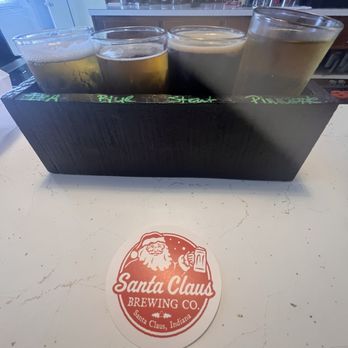Santa Claus Brewery - A standard flight and sticker pic - Breweries Near Me - Santa Claus, Indiana Santa Claus Brewery - A standard flight and sticker pic - Breweries Near Me - Santa Claus, Indiana