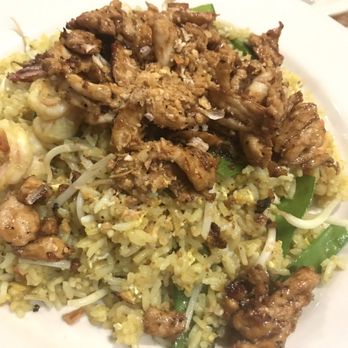 Andaman Thai Restaurant - Turmeric Fried Rice with Chicken and Garlic - Thai Near Me - Denton, Texas Andaman Thai Restaurant - Turmeric Fried Rice with Chicken and Garlic - Thai Near Me - Denton, Texas
