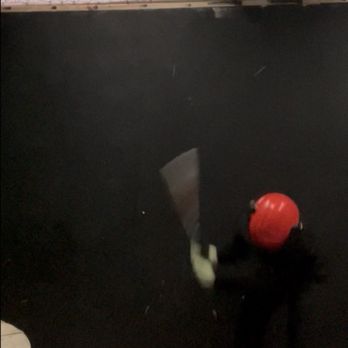 Rage Cage Joliet - Me smashing a copy/fax machine with a bat - Team Building Activities Near Me - Joliet, Illinois