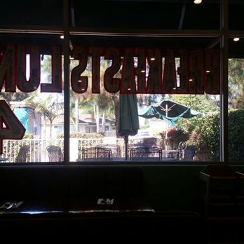 Popular Cafe - My window view to look at worn and torn umbrellas and rusty fence - American Near Me - Montclair, California Popular Cafe - My window view to look at worn and torn umbrellas and rusty fence - American Near Me - Montclair, California