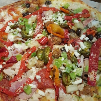 MOD Pizza - Half red sauce,  half white with pesto. .. I prefer the red. .. very good pizza,  friendly service - Pizza Near Me - Fontana, California