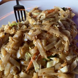 a plate of stir fried noodles