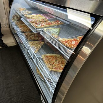 Albert's Pizza - Some of the specialty slices. - Pizza Near Me - Ronkonkoma, New York Albert's Pizza - Some of the specialty slices. - Pizza Near Me - Ronkonkoma, New York