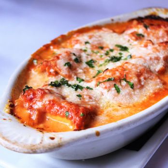 Carmelina's - Rollati di Pasta - Rolls of Fresh Pasta Stuffed with Prosciutto, Spinach, & Fontina Cheese, Baked with a Fragrant Pink Sauce - Italian Near Me - Boston, Massachusetts