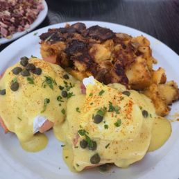 Lox eggs Benedict with home fries. 10/10 Lox eggs Benedict with home fries. 10/10