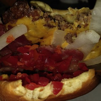 Shake Shack Hilldale Center - Inside view showing cherry peppers, onions and that's American cheese which I can go without. - Burgers Near Me - Madison, Wisconsin