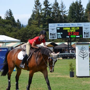 Melodic Farms - Sabrina Voeller and Spyder smiling after stealing the lead by quite a few seconds - Horseback Riding Near Me - Davis, California