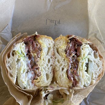 The Mustard Seed - The Lucky: hot pastrami, Swiss, coleslaw, caramelized onion, pickles, mustard - Delis Near Me - Lutz, Florida The Mustard Seed - The Lucky: hot pastrami, Swiss, coleslaw, caramelized onion, pickles, mustard - Delis Near Me - Lutz, Florida