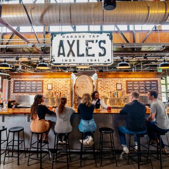 Axle's Garage Tap - people sitting at a bar - Beer Bar Near Me - Indianapolis, Indiana Axle's Garage Tap - people sitting at a bar - Beer Bar Near Me - Indianapolis, Indiana