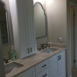 Master Bath with new cabinets, mirrors and marble countertops Master Bath with new cabinets, mirrors and marble countertops