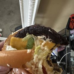 McDonald's - Super burnt patty and a bacon burger with no bacon . Nasty fries brown like they haven't changed the oil .