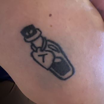 Rock N Roll Tattoo - It looks bruised but it's Blown out ink under the skin that I will have for the rest of my life - Tattoo Near Me - Las Vegas, Nevada Rock N Roll Tattoo - It looks bruised but it's Blown out ink under the skin that I will have for the rest of my life - Tattoo Near Me - Las Vegas, Nevada