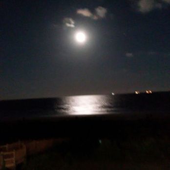 The Breeze Beachfront Resort - Full moon over the gulf. The Breeze Hotel in Surfside TX. - RV Parks Near Me - Surfside Beach, Texas The Breeze Beachfront Resort - Full moon over the gulf. The Breeze Hotel in Surfside TX. - RV Parks Near Me - Surfside Beach, Texas