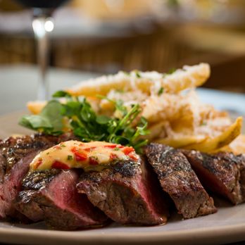 Conroux - STEAK FRITES:
10oz New York strip, red pepper-garlic butter, parmesan french fries - Diners Near Me - Conroe, Texas