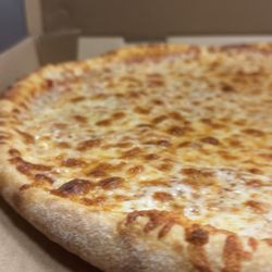 Hangout Pizza & Pub - We've dedicated ourselves to perfecting our pizza, and we're proud to have crafted a crust that's sure to delight our customers.