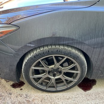 The Detailing Pros Reno - Oil dripping into the engine bay and into the water channels through the seams. - Auto Detailing Near Me - Sparks, Nevada The Detailing Pros Reno - Oil dripping into the engine bay and into the water channels through the seams. - Auto Detailing Near Me - Sparks, Nevada