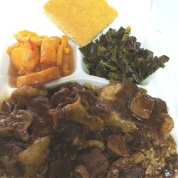 MY Brother's Soulfood - Oxtails served on white rice with collard greens, yams & corn bread