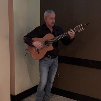Surla's - Guitarist who serenaded is during appetizers - Asian Fusion Near Me - Modesto, California Surla's - Guitarist who serenaded is during appetizers - Asian Fusion Near Me - Modesto, California