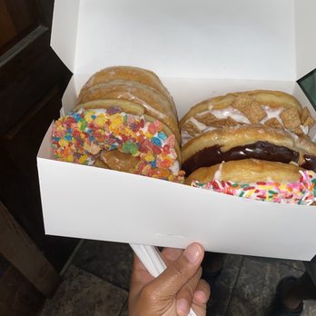 Dough J's Chicken and Donuts - a hand holding a box of doughnuts - Donuts Near Me - Webster, Florida