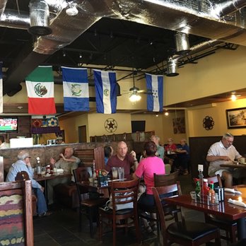 Lily's Cafe - Flags on the ceiling. Which one is the Guatemala flag? - Latin American Near Me - Plano, Texas