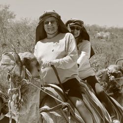 Wild Canyon - My wife and I riding a camel.