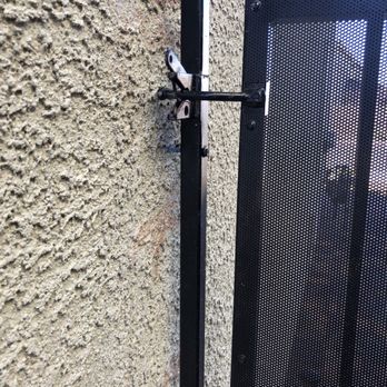 Beautify - Hate is lopsided and barely secured to the stucco - Landscaping Near Me