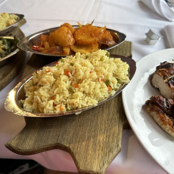 Algarve Restaurant - rice and roasted potatoes. - Portuguese Near Me - Elizabeth, New Jersey Algarve Restaurant - rice and roasted potatoes. - Portuguese Near Me - Elizabeth, New Jersey