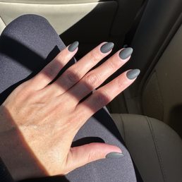 Matte black nails done by Denny