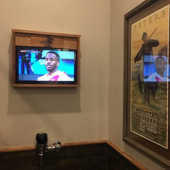 Decoys Seafood - TV above the urinal so you can keep up with NFL football in the fall!!! - Seafood Near Me - Suffolk, Virginia