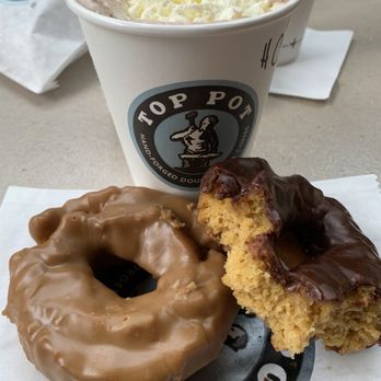 Top Pot Doughnuts - Pumpkin Maple Doughnut, Pumpkin Chocolate Doughnut, Hot Chocolate with Whipped Cream! - Bakeries Near Me - Seattle, Washington
