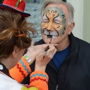 Silly Sally's - Tiger face-painting with Silly Sallys - Clowns Near Me