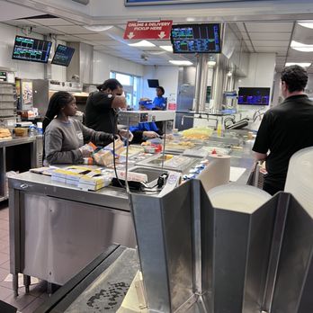 White Castle - a group of people at a counter in a fast food restaurant - Burgers Near Me - South Plainfield, New Jersey