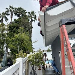 Bayside Gutters - Aluminum white gutter installation in Huntington Beach