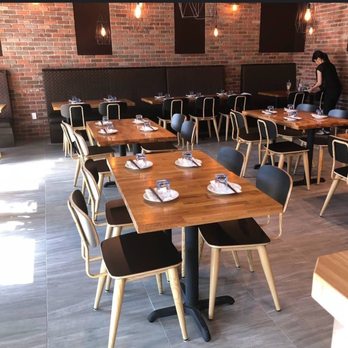 Banchan Korean Bistro - tables and chairs in a restaurant - Korean Near Me - Langley, British Columbia Banchan Korean Bistro - tables and chairs in a restaurant - Korean Near Me - Langley, British Columbia