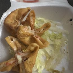 Delicious crab Rangoon!! We ate 2 already but it came with 5. Love it!!