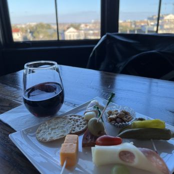 Andrew Pinckney Inn - Wine & cheese platter overlooking Charleston, in the rooftop solarium. - Hotels Near Me - Charleston, South Carolina Andrew Pinckney Inn - Wine & cheese platter overlooking Charleston, in the rooftop solarium. - Hotels Near Me - Charleston, South Carolina