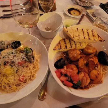 Grand Cafe Key West - White garlic sauce seafood pasta and red sauce seafood pasta - New American Near Me - Key West, Florida Grand Cafe Key West - White garlic sauce seafood pasta and red sauce seafood pasta - New American Near Me - Key West, Florida