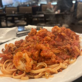 Bellagio Pizzeria - Amazing calamari with hot peppers over linguine - Pizza Near Me - Farmingdale, New York