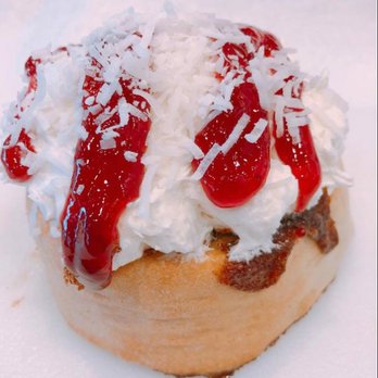 Cinnaholic - a pastry with whipped cream and cherries - Bakeries Near Me - Victoria, British Columbia Cinnaholic - a pastry with whipped cream and cherries - Bakeries Near Me - Victoria, British Columbia