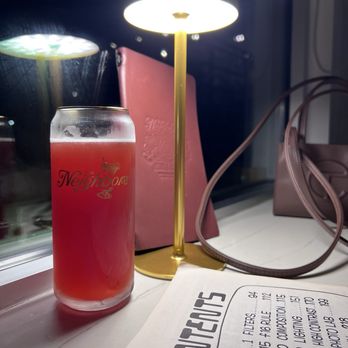 The Neighbors - Riot Juice: A canned sour ale (flavor: Blackberry, Lime, and Vanilla) served in a chilled glass - Cocktail Bars Near Me - Orlando, Florida The Neighbors - Riot Juice: A canned sour ale (flavor: Blackberry, Lime, and Vanilla) served in a chilled glass - Cocktail Bars Near Me - Orlando, Florida