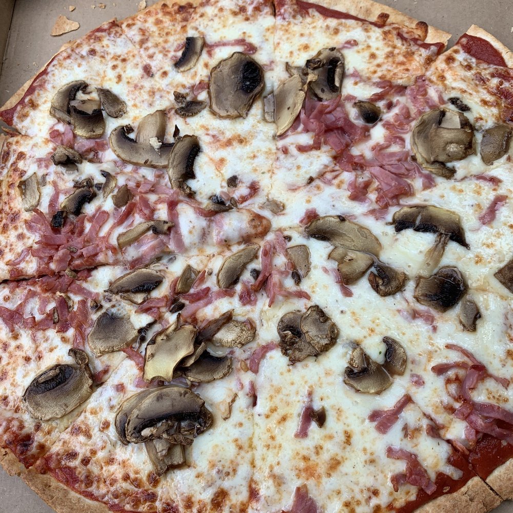 I ordered a thin crust ham and mushroom pizza. I ordered a thin crust ham and mushroom pizza. 