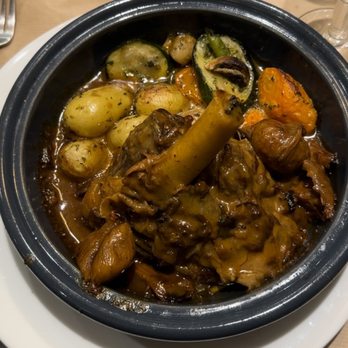La Jacobine - Lamb shank served in a piping hot crock. - Tea Rooms Near Me - Paris, 75
