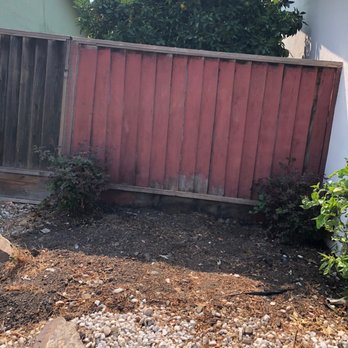 DV hardscape LLC - the back of a fence - Junk Removal & Hauling Near Me