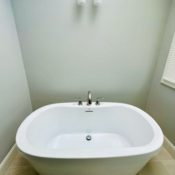 Building Buddies - Tiled floor, bathtub, faucet, and light fixture - General Contractors Near Me - Pittsburgh, Pennsylvania Building Buddies - Tiled floor, bathtub, faucet, and light fixture - General Contractors Near Me - Pittsburgh, Pennsylvania