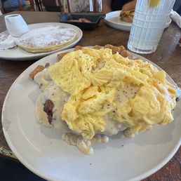 Chicken and biscuit with scrambled eggs and potato tots. Must try!!! Chicken and biscuit with scrambled eggs and potato tots. Must try!!!