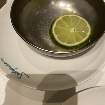 Satyricon - Lime and warm water to wash the fish off your hands - Seafood Near Me - Rio de Janeiro, RJ Satyricon - Lime and warm water to wash the fish off your hands - Seafood Near Me - Rio de Janeiro, RJ