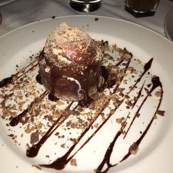 Chart House - Lava cake with toffee chips, almonds, and vanilla ice cream. - Seafood Near Me - Alexandria, Virginia Chart House - Lava cake with toffee chips, almonds, and vanilla ice cream. - Seafood Near Me - Alexandria, Virginia